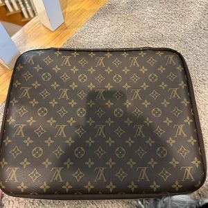 Louis Vuitton laptop case new never used. 100%authentic.